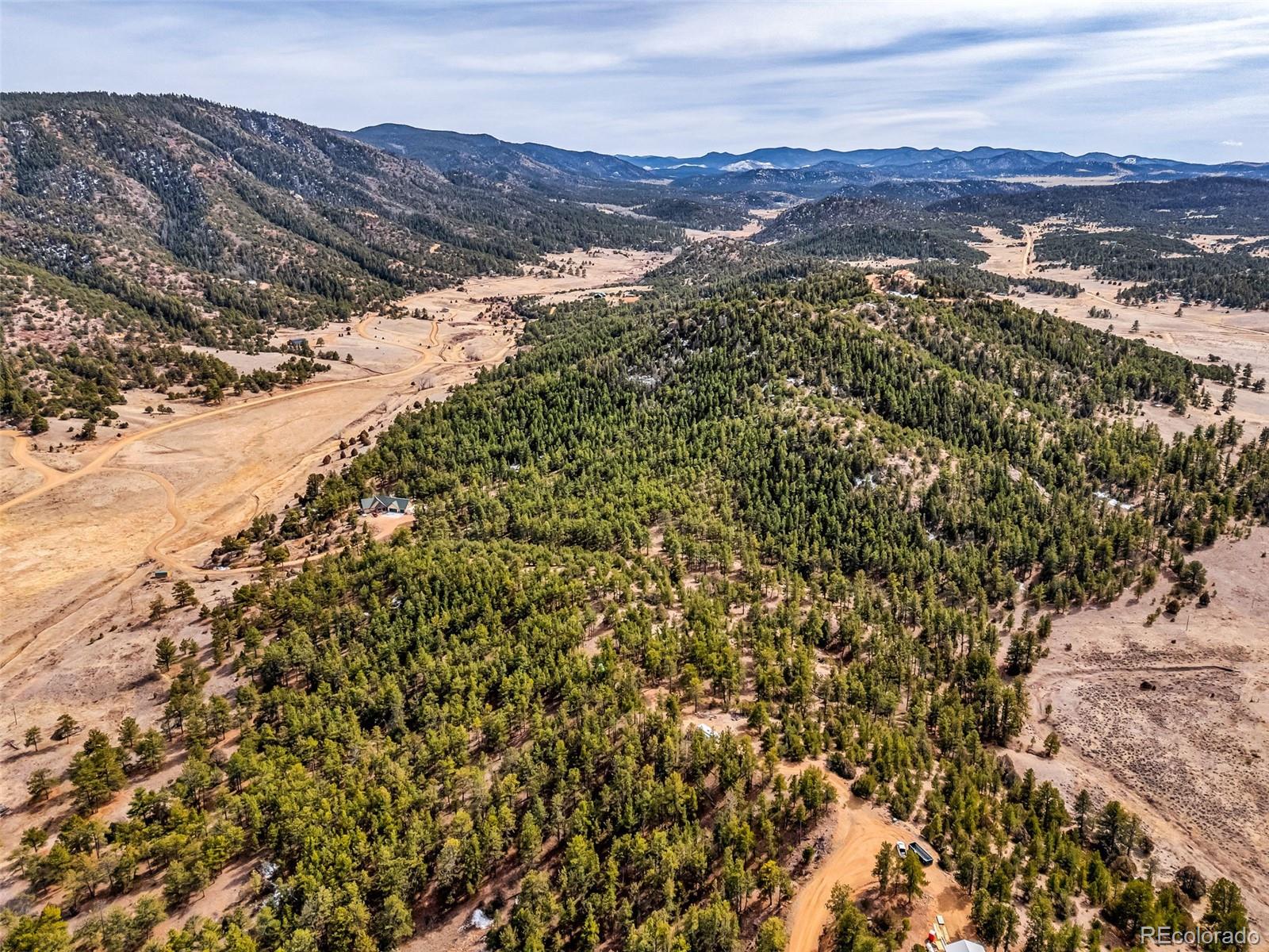 380 Buck Ridge Canon City, CO 81212 - Photo 4 of 28 a view of a mountain range with lush green hillside