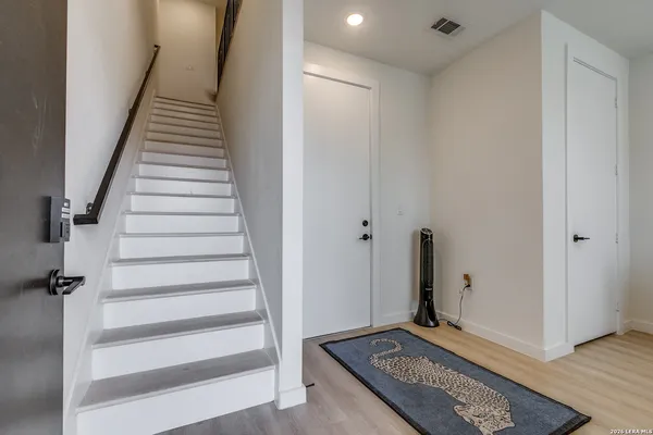 a view of an entryway with staircase