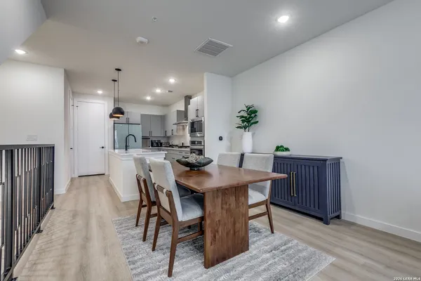 a view of a dining room with furniture