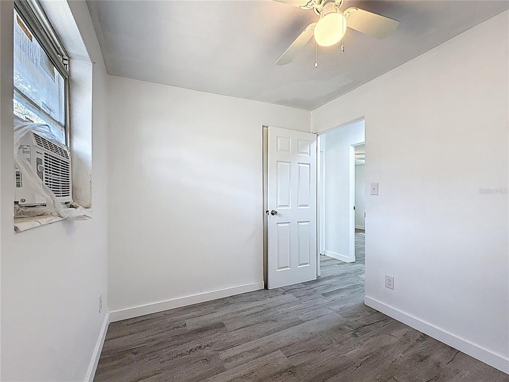 319 Leta Street Auburndale, FL 33823 - Photo 31 of 45 wooden floor in an empty room