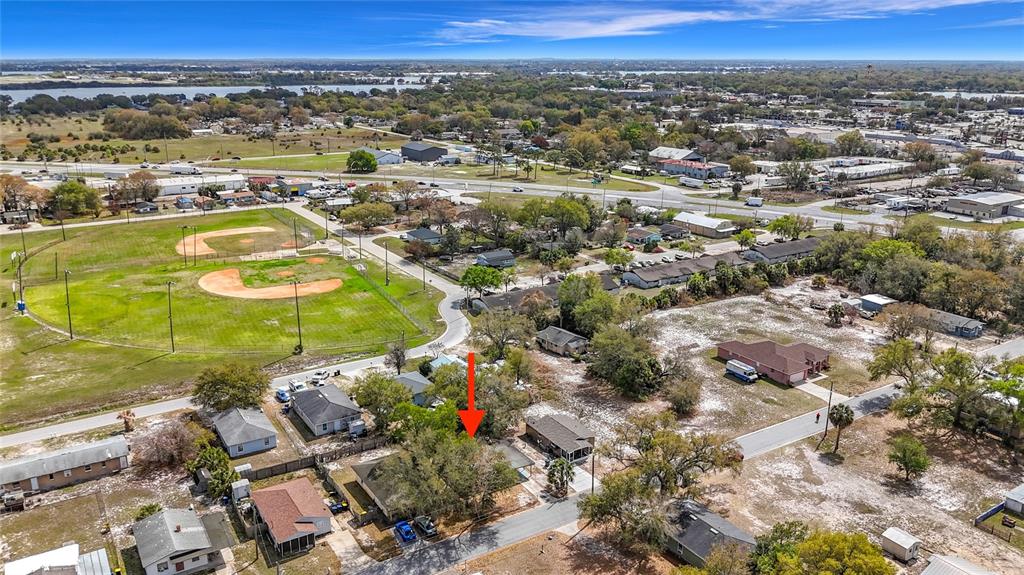 319 Leta Street Auburndale, FL 33823 - Photo 34 of 45 an aerial view of residential houses with outdoor space