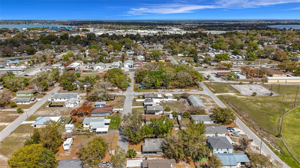 319 Leta Street Auburndale, FL 33823 - Photo 37 of 45 an aerial view of residential houses with outdoor space
