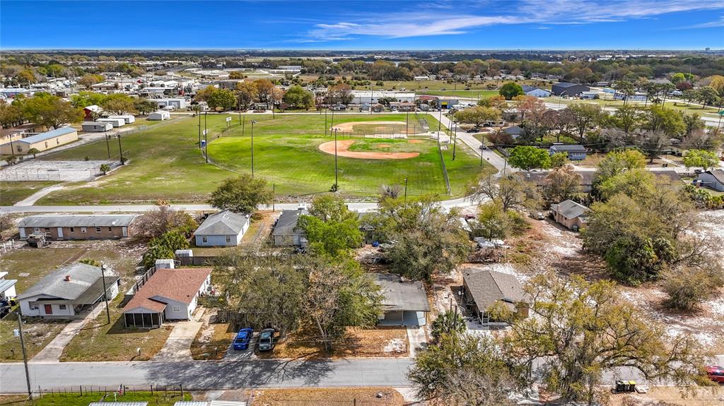 319 Leta Street Auburndale, FL 33823 - Photo 40 of 45 an aerial view of residential houses with outdoor space