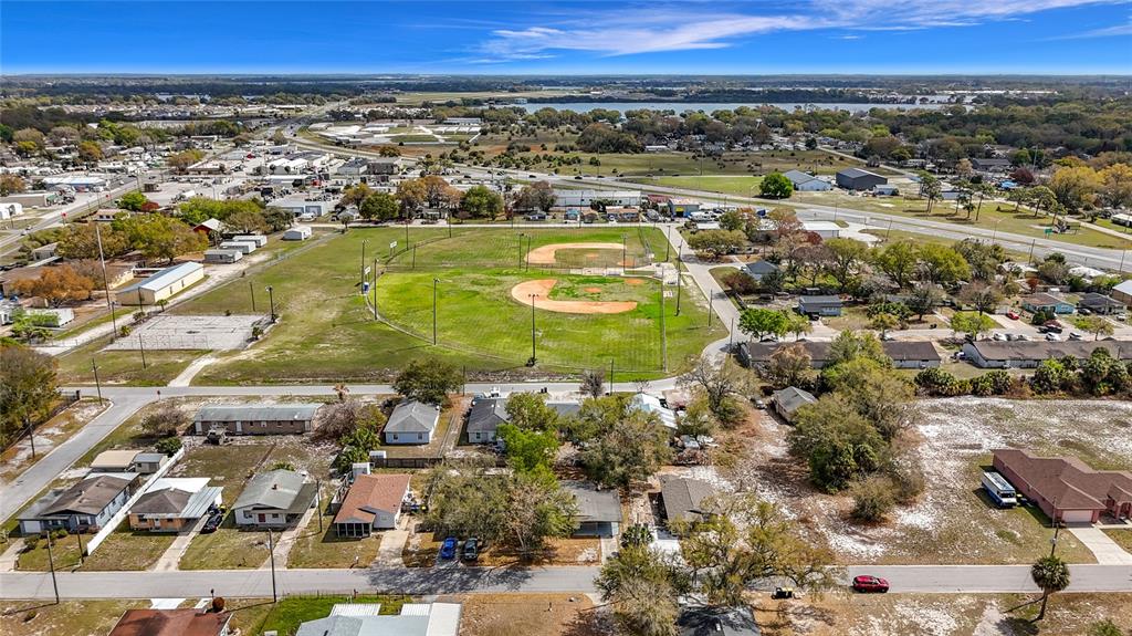 319 Leta Street Auburndale, FL 33823 - Photo 41 of 45 an aerial view of residential houses with outdoor space