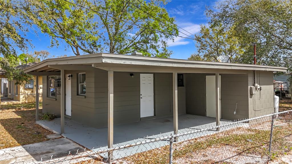 319 Leta Street Auburndale, FL 33823 - Photo 9 of 45 a view of a house with tree