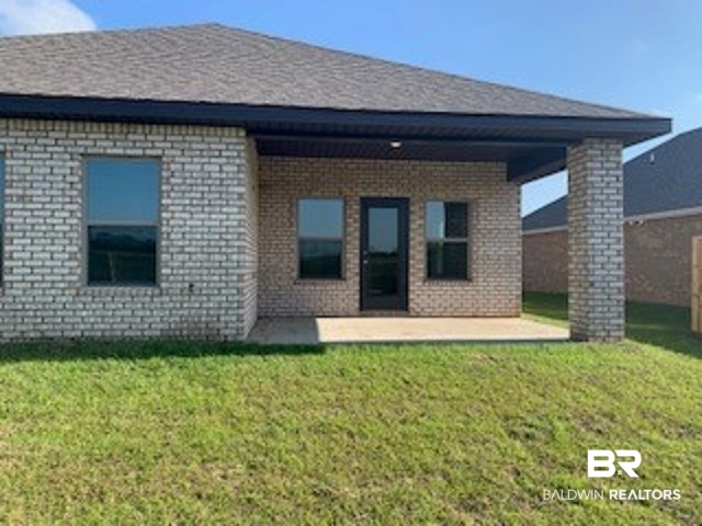 19337 Kudu Avenue, Unit 34 Foley, AL 36535 - Photo 13 of 19 Covered back porch