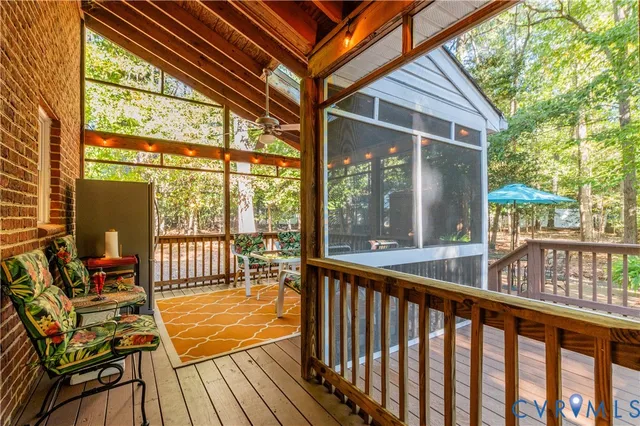 a view of a two chairs in the balcony