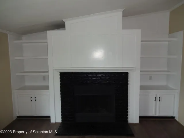 a room with a fireplace