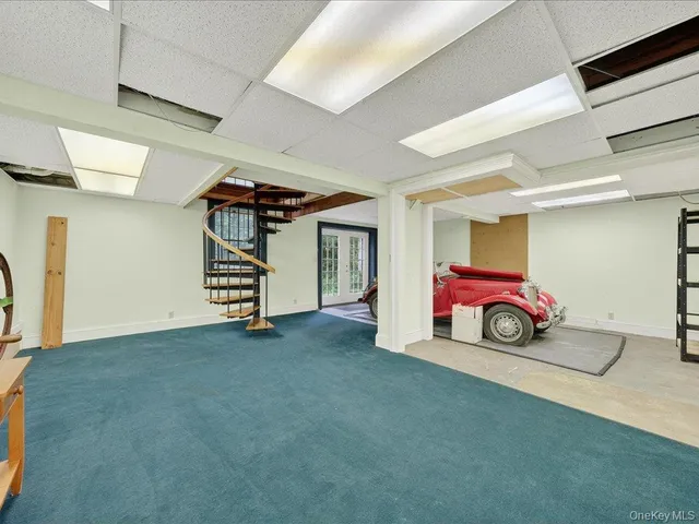 a view of livingroom with furniture and windows