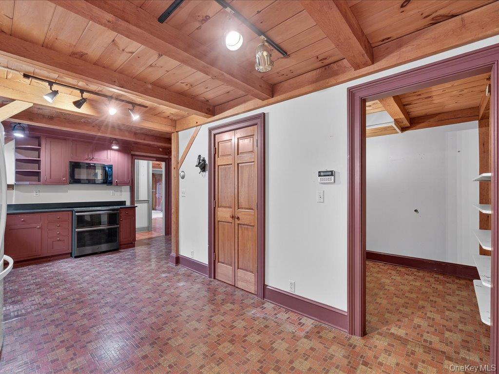 121 Valley Farm Road Millbrook, NY 12545 - Photo 9 of 34 a big room with closet and a kitchen space