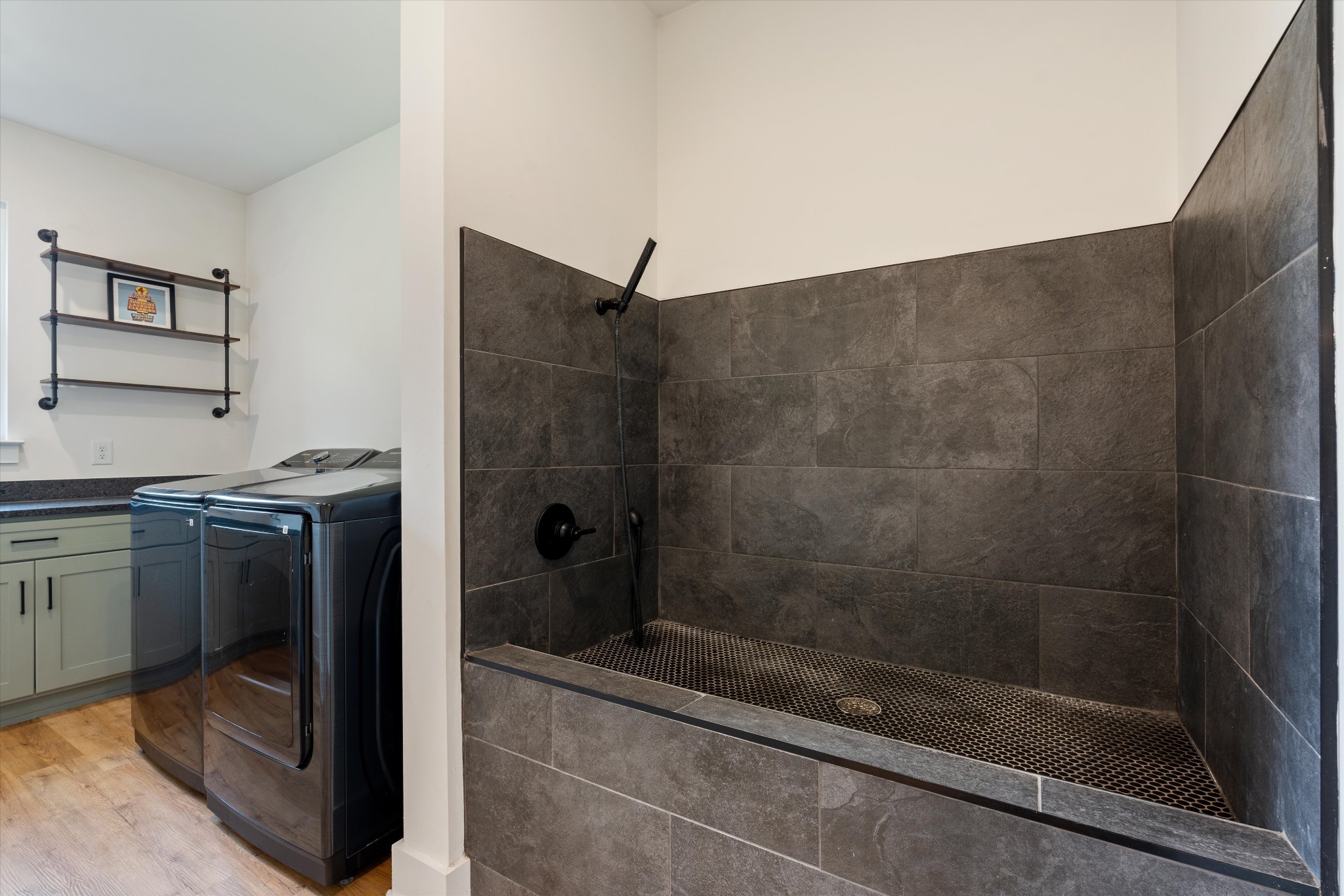 290 Dink Rut Road Portland, TN 37148 - Photo 32 of 66 a bathroom with a granite countertop shower a mirror and a sink