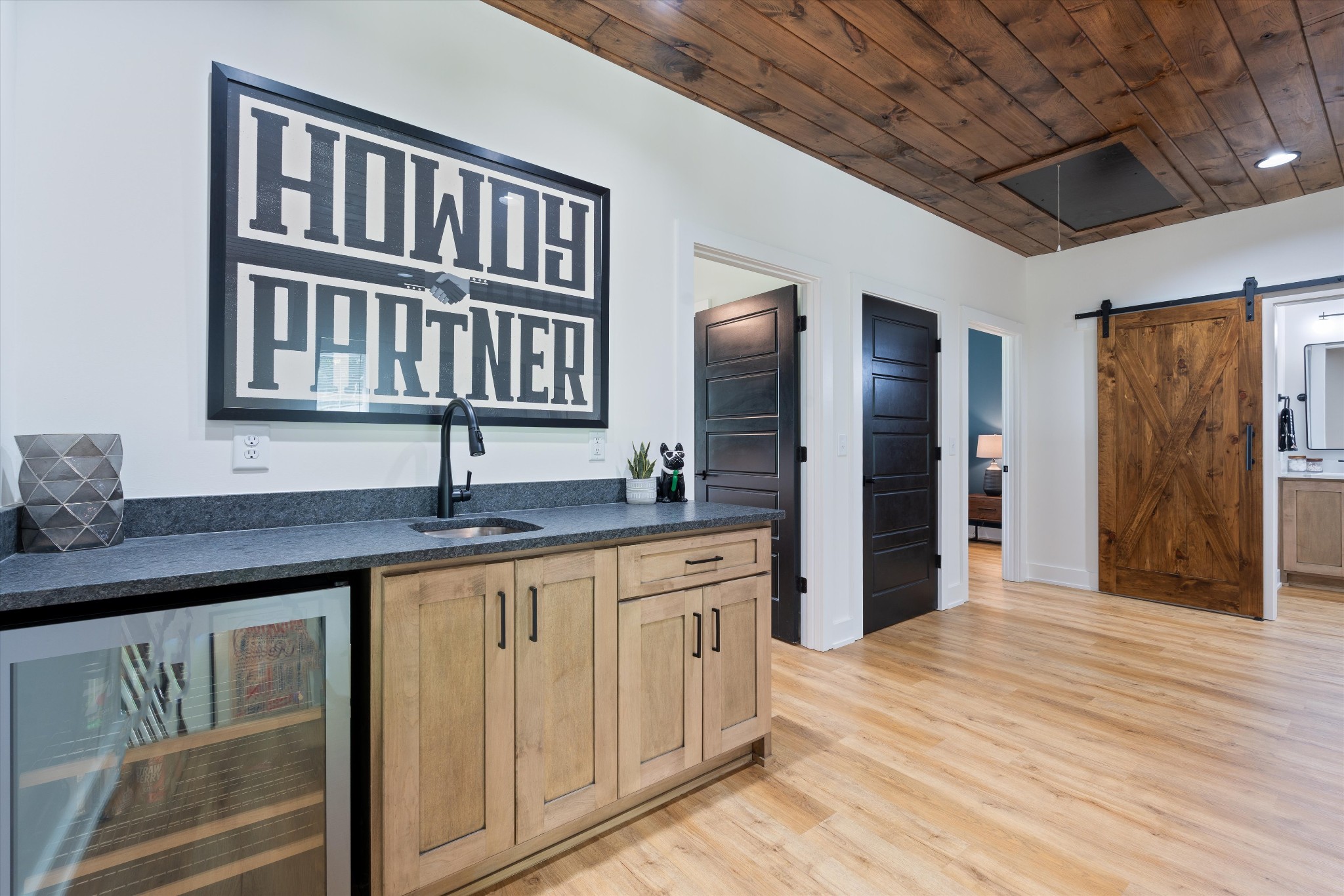 290 Dink Rut Road Portland, TN 37148 - Photo 39 of 66 a spacious bathroom with a granite countertop sink and a mirror