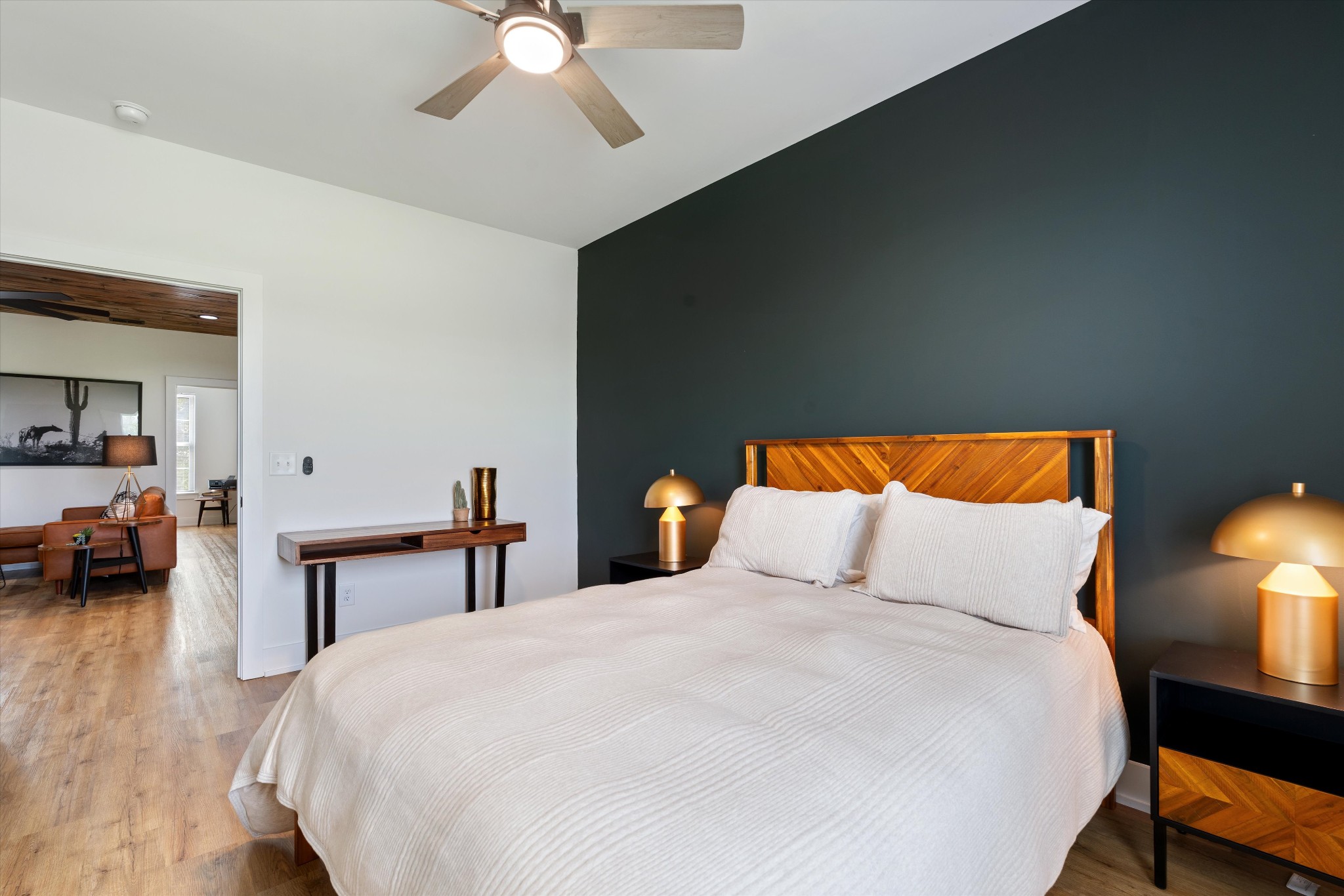 290 Dink Rut Road Portland, TN 37148 - Photo 41 of 66 a bedroom with a bed and a chandelier