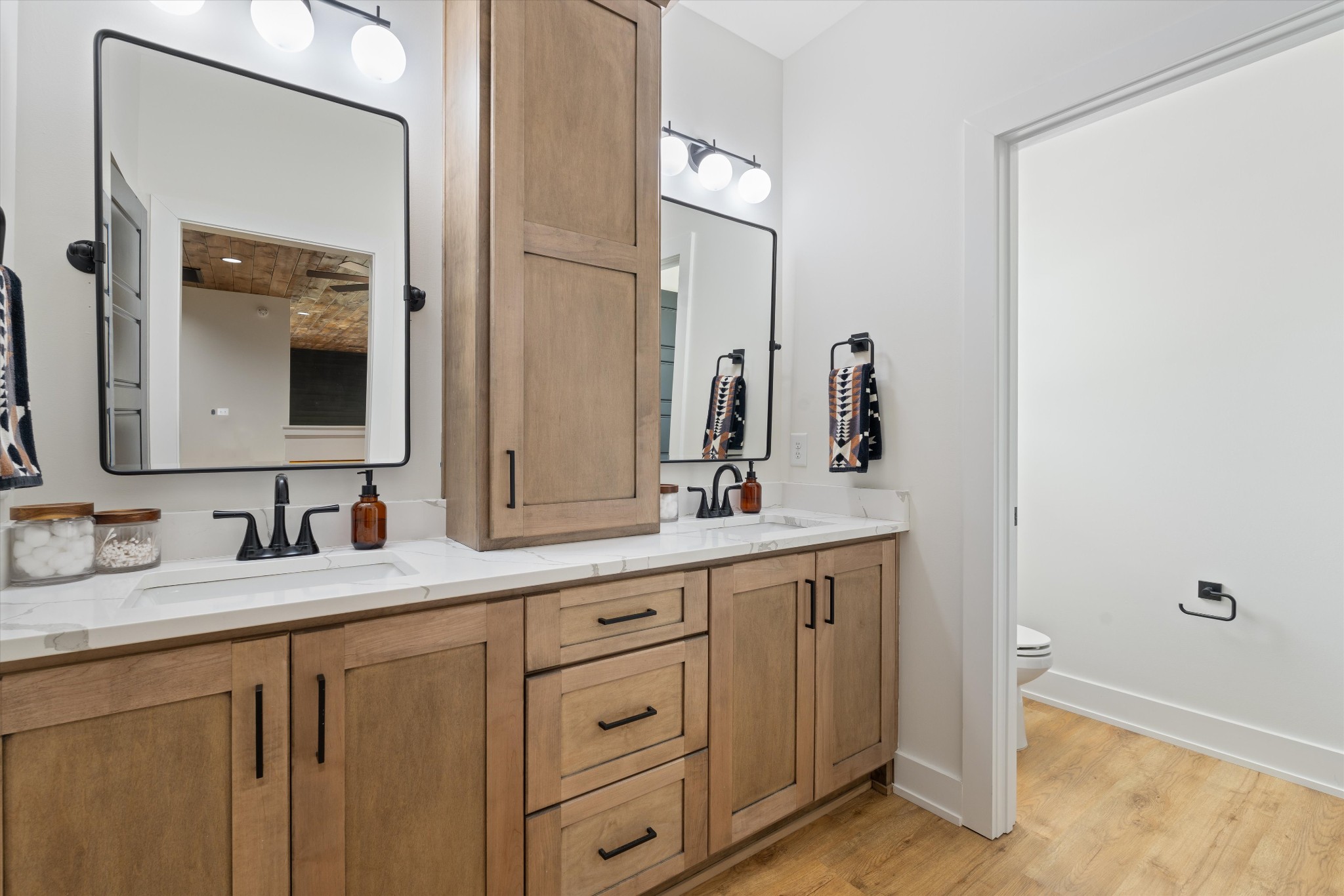 290 Dink Rut Road Portland, TN 37148 - Photo 42 of 66 a bathroom with a double vanity sink and mirror