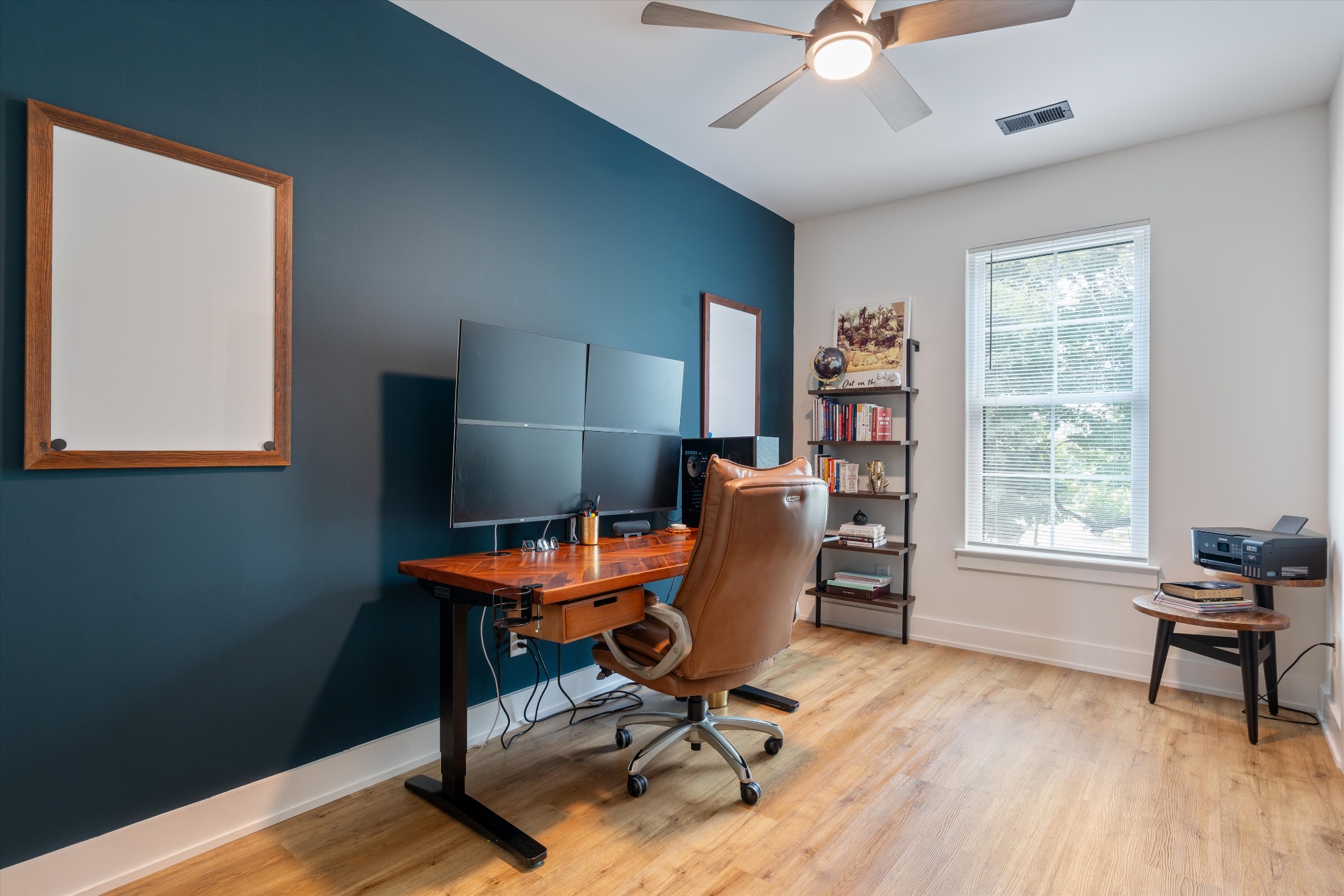 290 Dink Rut Road Portland, TN 37148 - Photo 45 of 66 a workspace with wooden floor and a window