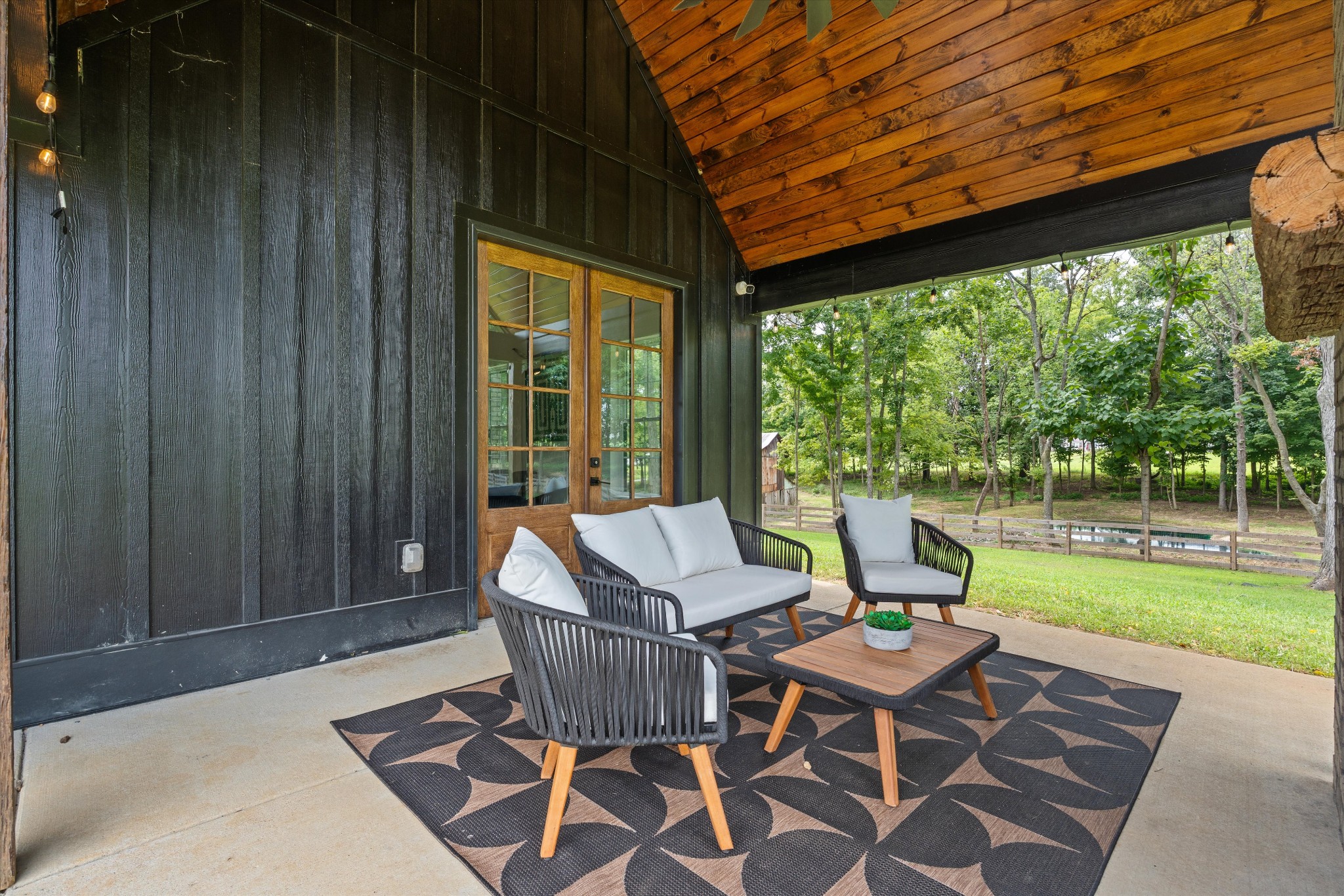 290 Dink Rut Road Portland, TN 37148 - Photo 50 of 66 a patio with yard glass top table and chairs