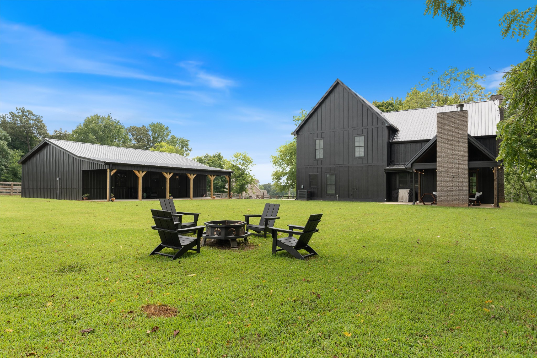290 Dink Rut Road Portland, TN 37148 - Photo 52 of 66 a swimming pool with outdoor seating and yard