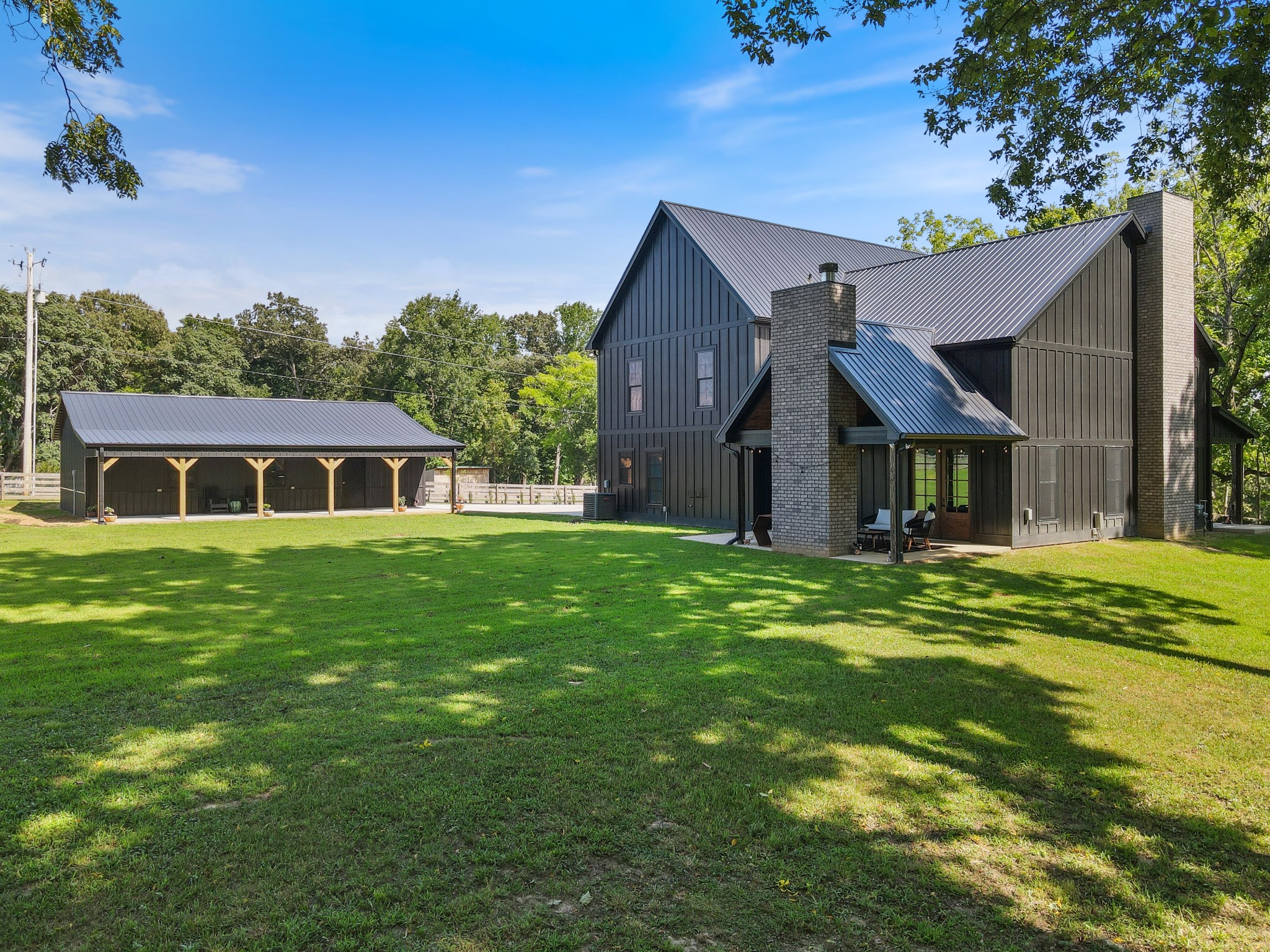 290 Dink Rut Road Portland, TN 37148 - Photo 6 of 66 a front view of a house with a garden