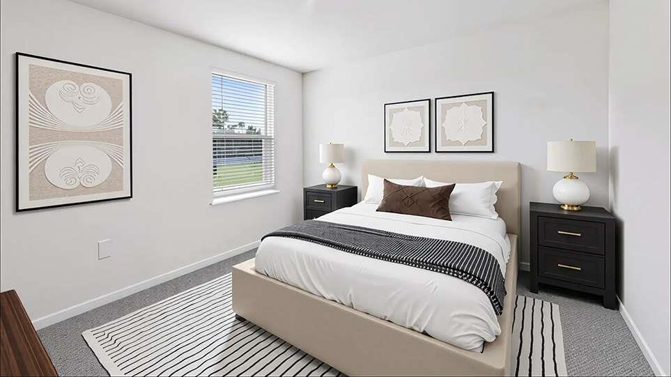 6022 Knickerbocker Street Mableton, GA 30126 - Photo 9 of 11 a bedroom with a bed and a window