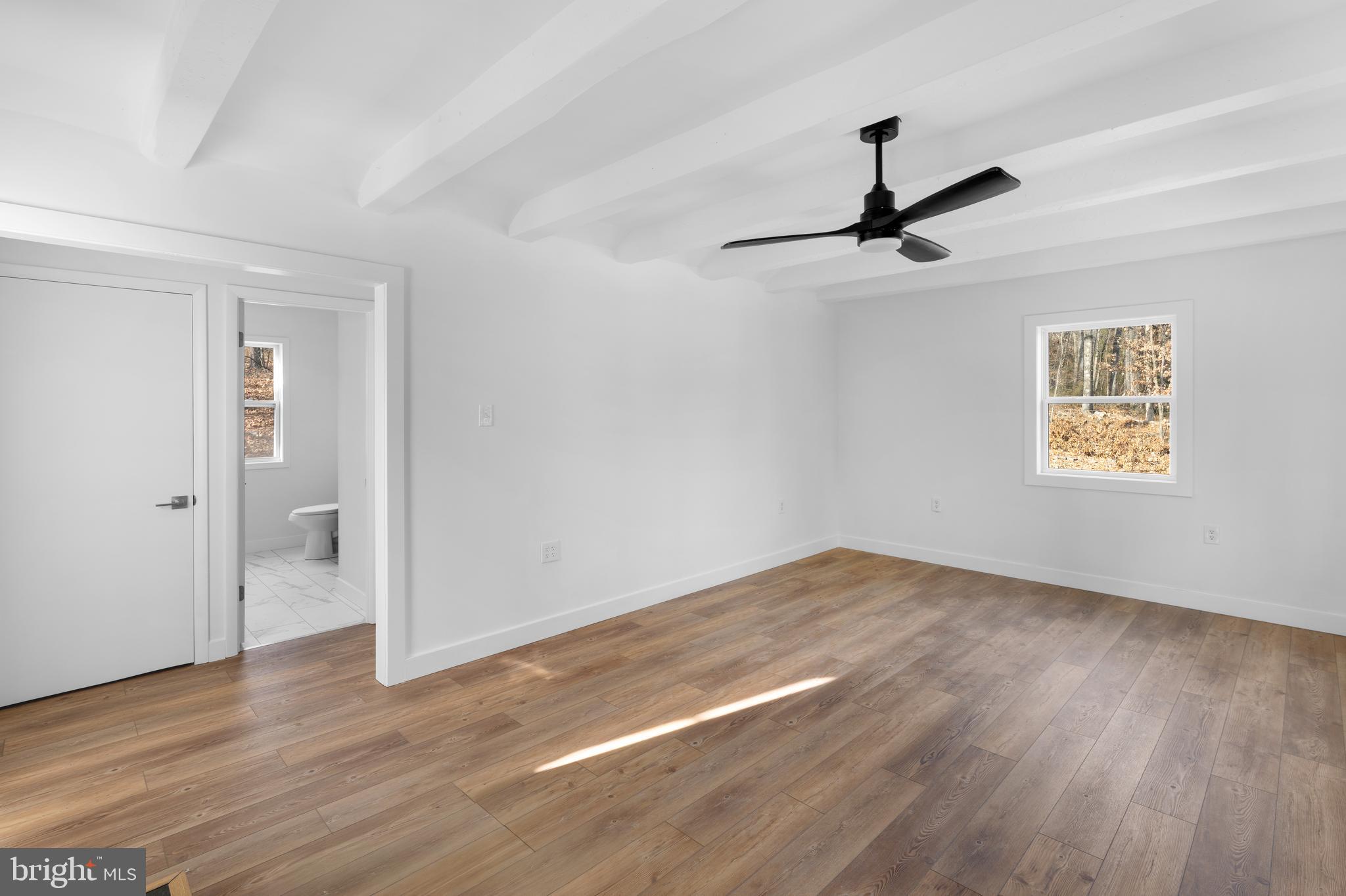 351 Ridgeview Road Gore, VA 22637 - Photo 20 of 31 an empty room with wooden floor closet and windows