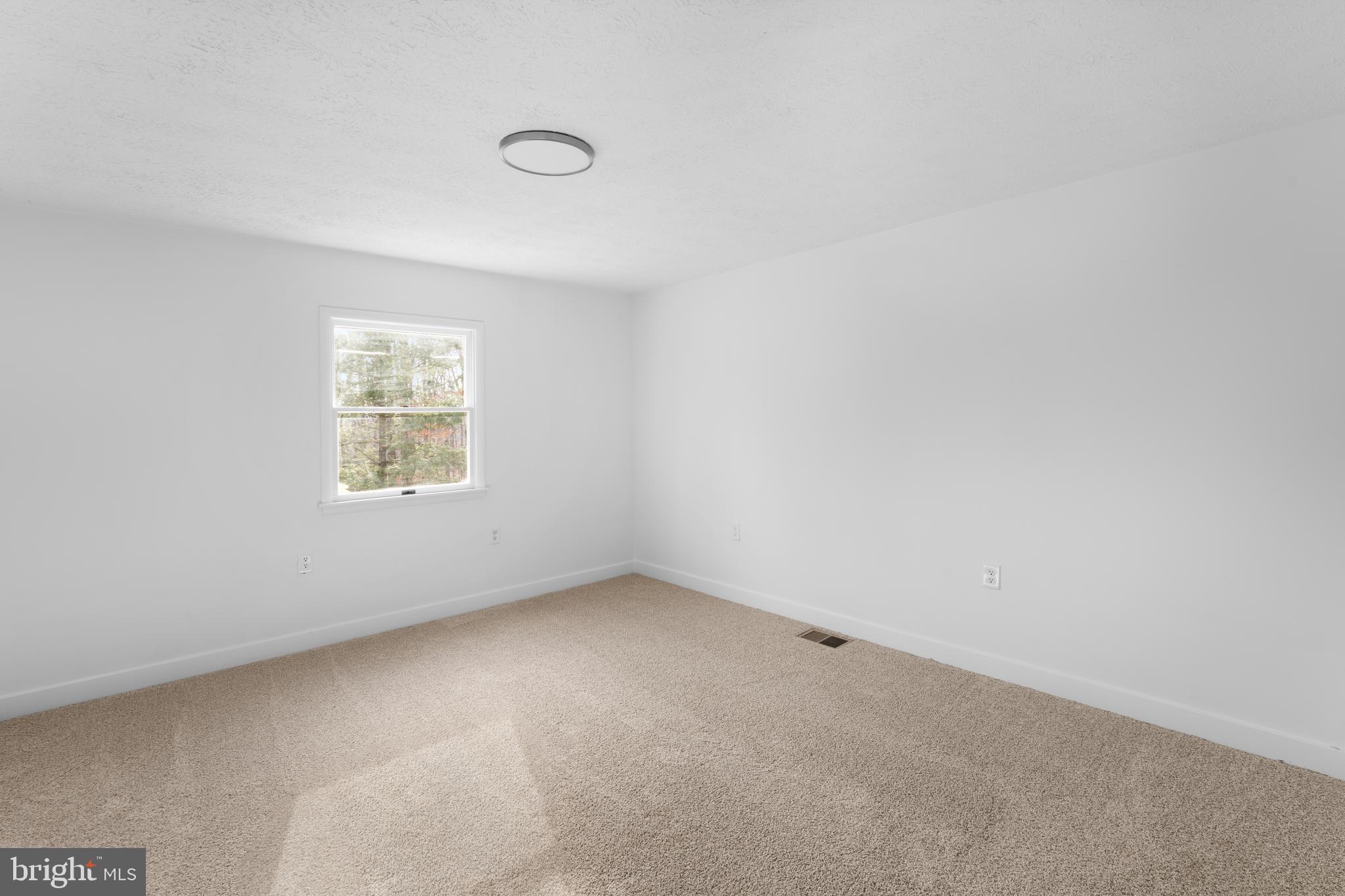 351 Ridgeview Road Gore, VA 22637 - Photo 30 of 31 an empty room with a window