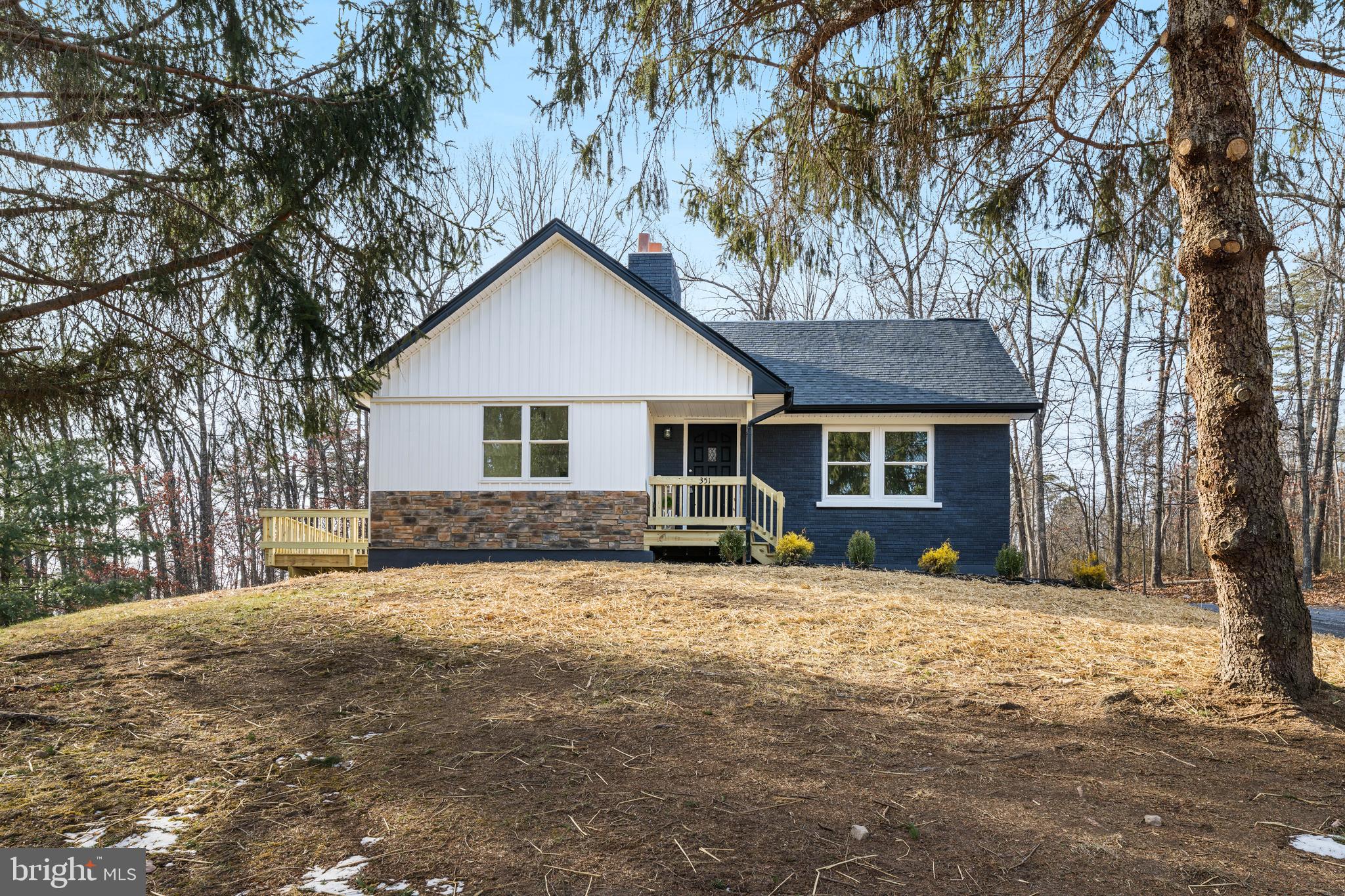351 Ridgeview Road Gore, VA 22637 - Photo 3 of 31 a view of a house with a yard covered in snow