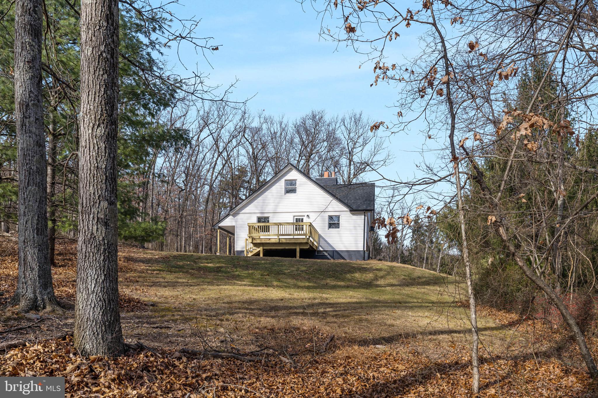 351 Ridgeview Road Gore, VA 22637 - Photo 4 of 31 a house that has a tree in front of it