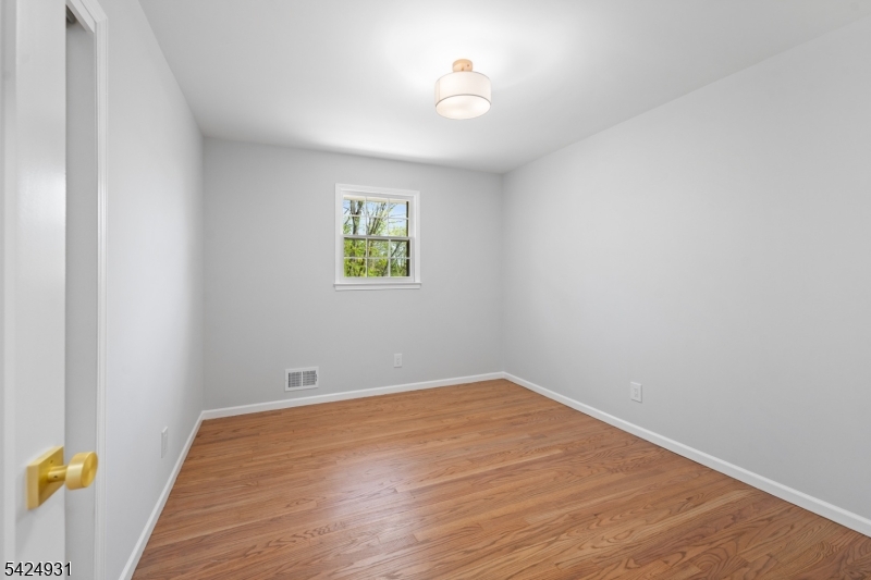 22 Hillcrest Road Hillsborough, NJ 08844 - Photo 16 of 35 an empty room with a window