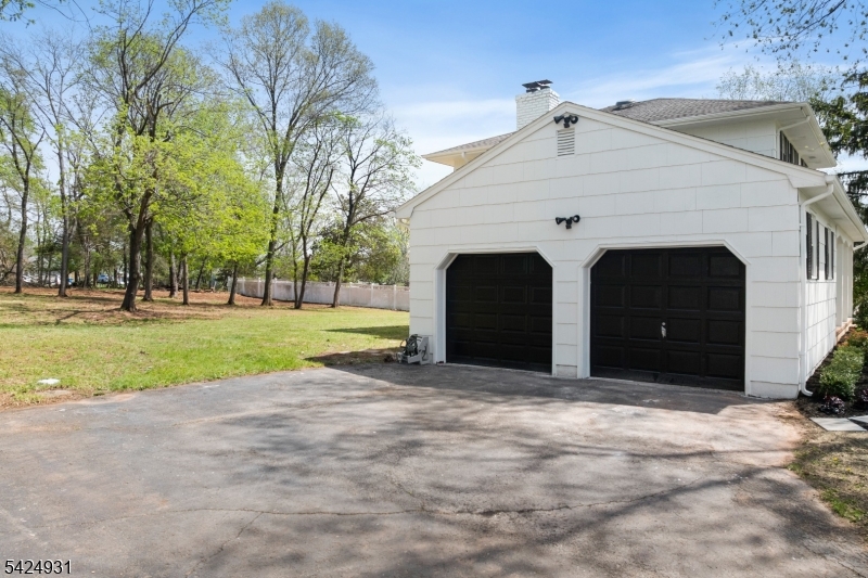22 Hillcrest Road Hillsborough, NJ 08844 - Photo 22 of 35 a front view of a house with a yard