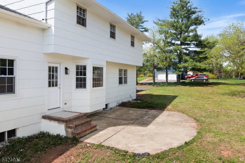 22 Hillcrest Road Hillsborough, NJ 08844 - Photo 24 of 35 a view of a house with backyard and trees