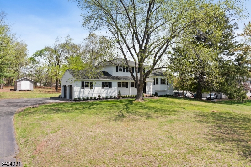 22 Hillcrest Road Hillsborough, NJ 08844 - Photo 28 of 35 a front view of a house with a garden