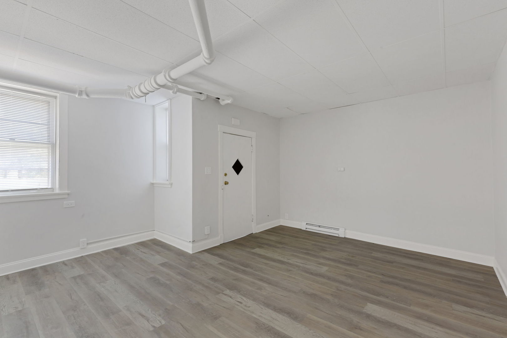 1001 Washington Street Evanston, IL 60202 - Photo 3 of 13 wooden floor in an empty room