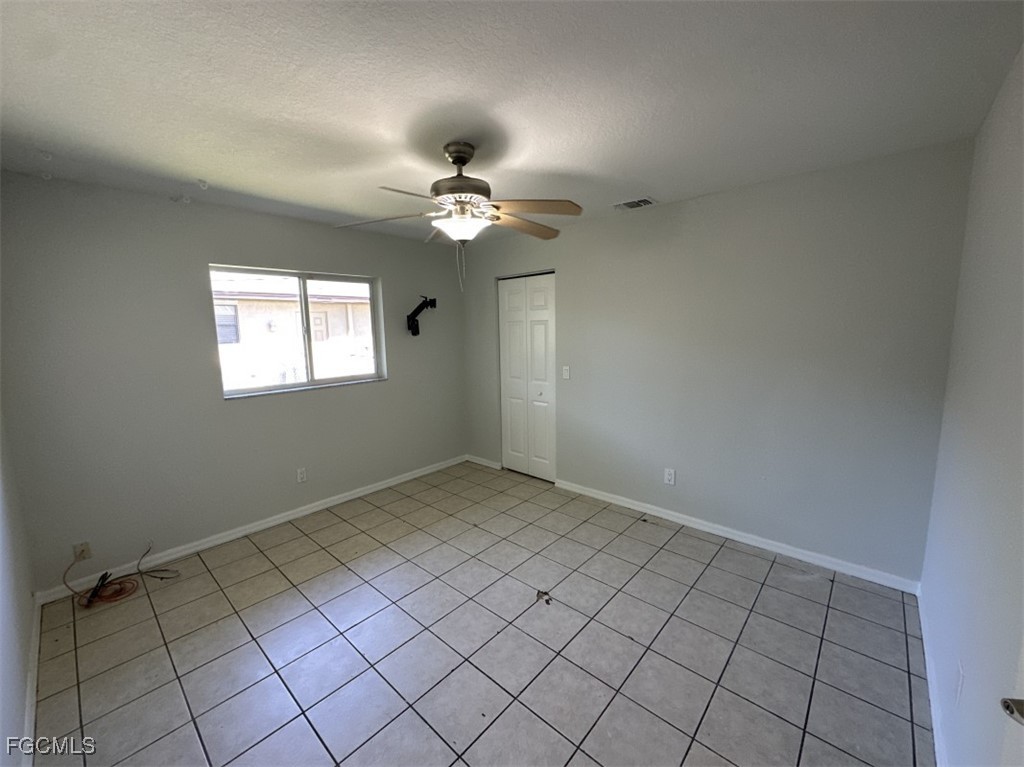 2400 Leavitt Road Alva, FL 33920 - Photo 15 of 26 a view of an empty room with a window