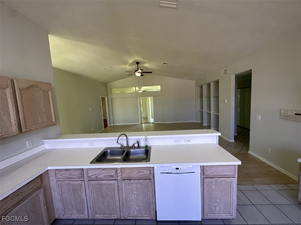 2400 Leavitt Road Alva, FL 33920 - Photo 20 of 26 a bathroom with a sink and a mirror