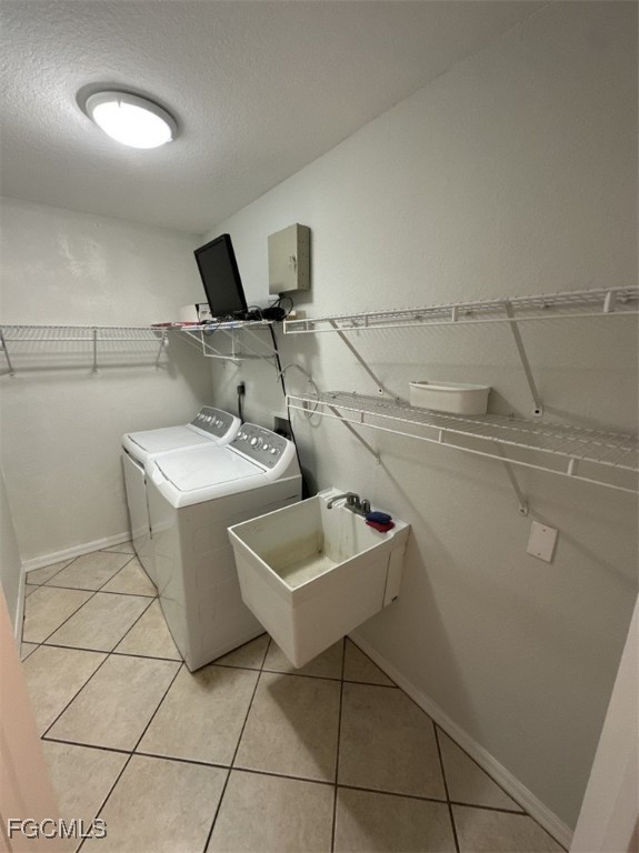 2400 Leavitt Road Alva, FL 33920 - Photo 23 of 26 a utility room with dryer and washer
