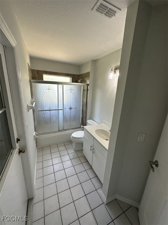 2400 Leavitt Road Alva, FL 33920 - Photo 24 of 26 a bathroom with a sink a toilet and a shower