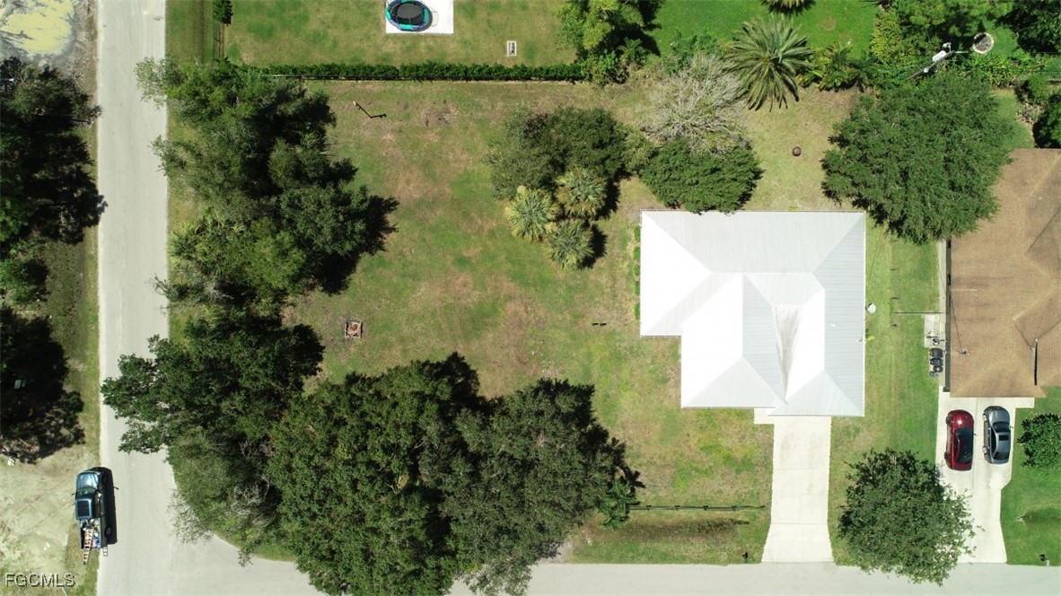 2400 Leavitt Road Alva, FL 33920 - Photo 9 of 26 an aerial view of a house with a yard