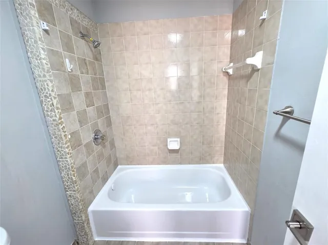 a bathroom with a bathtub
