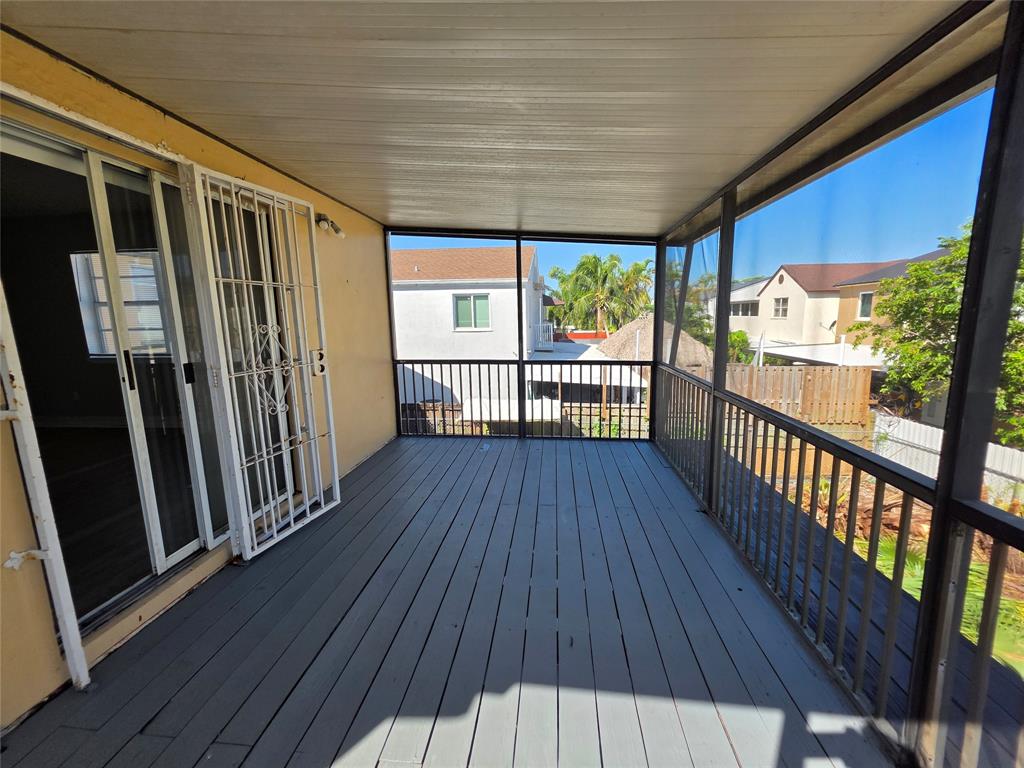 11951 Southwest 271st Terrace Homestead, FL 33032 - Photo 21 of 25 a view of a wooden deck