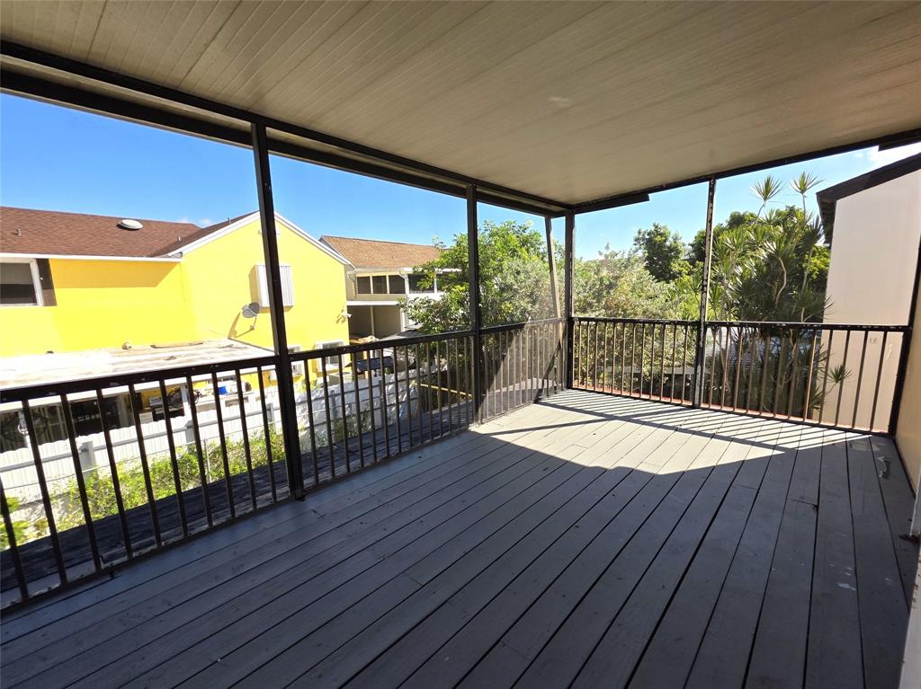 11951 Southwest 271st Terrace Homestead, FL 33032 - Photo 22 of 25 a view of a balcony with wooden floor
