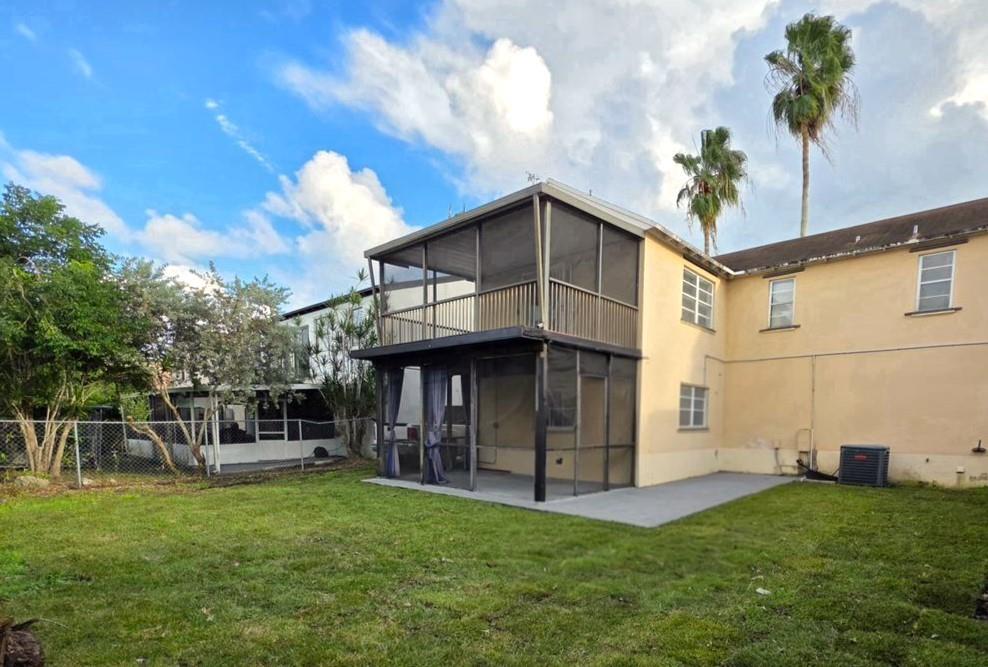 11951 Southwest 271st Terrace Homestead, FL 33032 - Photo 25 of 25 a view of a house with backyard and porch