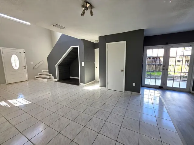a view of a livingroom with a staircase