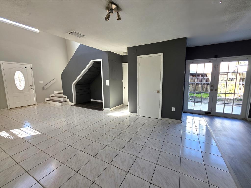 11951 Southwest 271st Terrace Homestead, FL 33032 - Photo 3 of 25 a view of a livingroom with a staircase