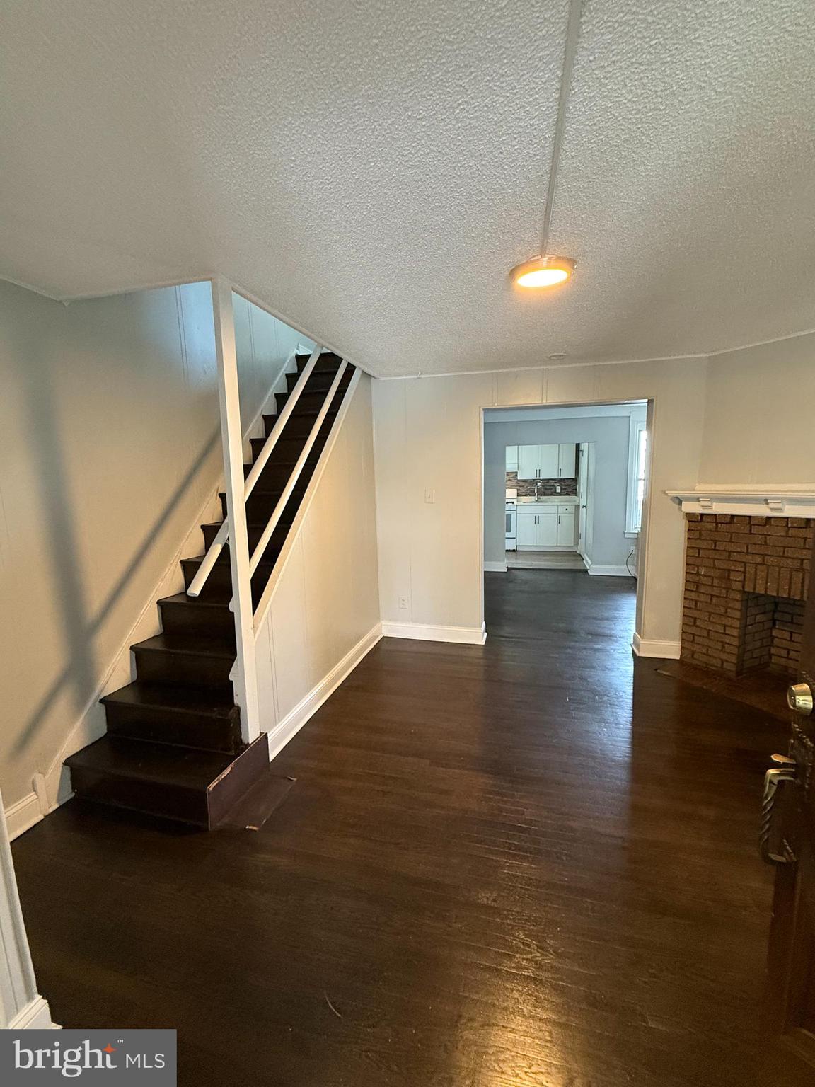 6921 Clinton Road Upper Darby, PA 19082 - Photo 5 of 17 a view of entryway and hall with wooden floor