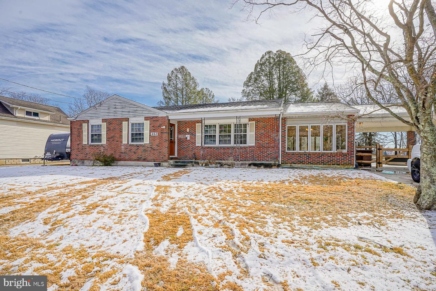 462 Carvin Street Clayton, NJ 08312 - Photo 1 of 29 a front view of a house with a yard