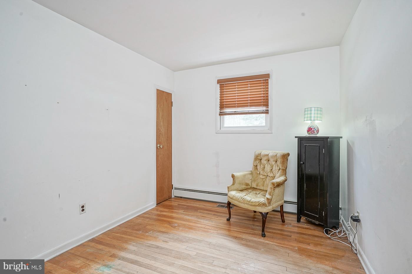 462 Carvin Street Clayton, NJ 08312 - Photo 12 of 29 a view of a workspace with furniture and a window