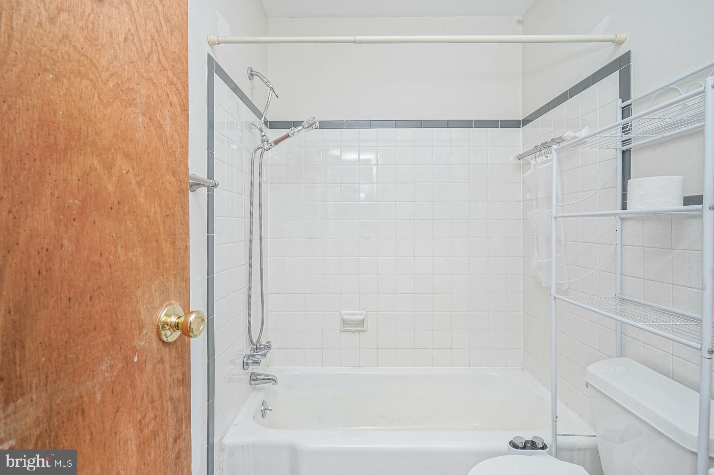 462 Carvin Street Clayton, NJ 08312 - Photo 16 of 29 a bathroom with a bathtub and a shower