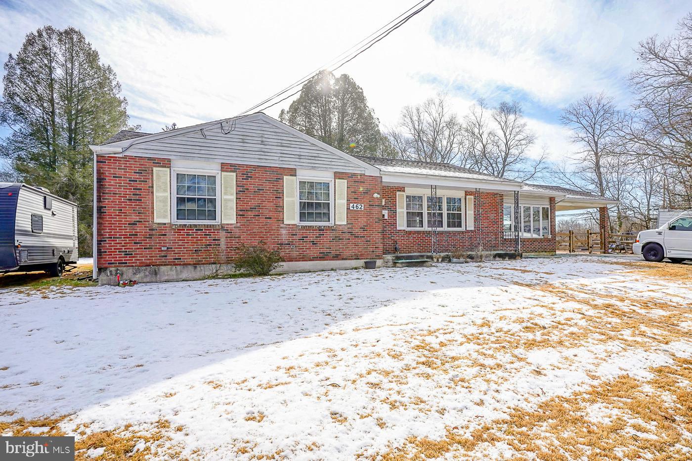 462 Carvin Street Clayton, NJ 08312 - Photo 2 of 29 a front view of a house with a yard