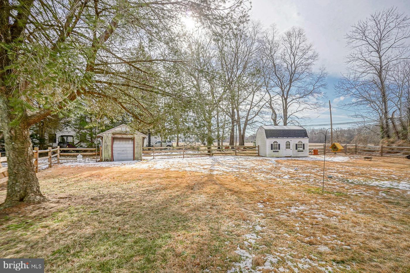 462 Carvin Street Clayton, NJ 08312 - Photo 29 of 29 a front view of a house with a yard and covered with trees