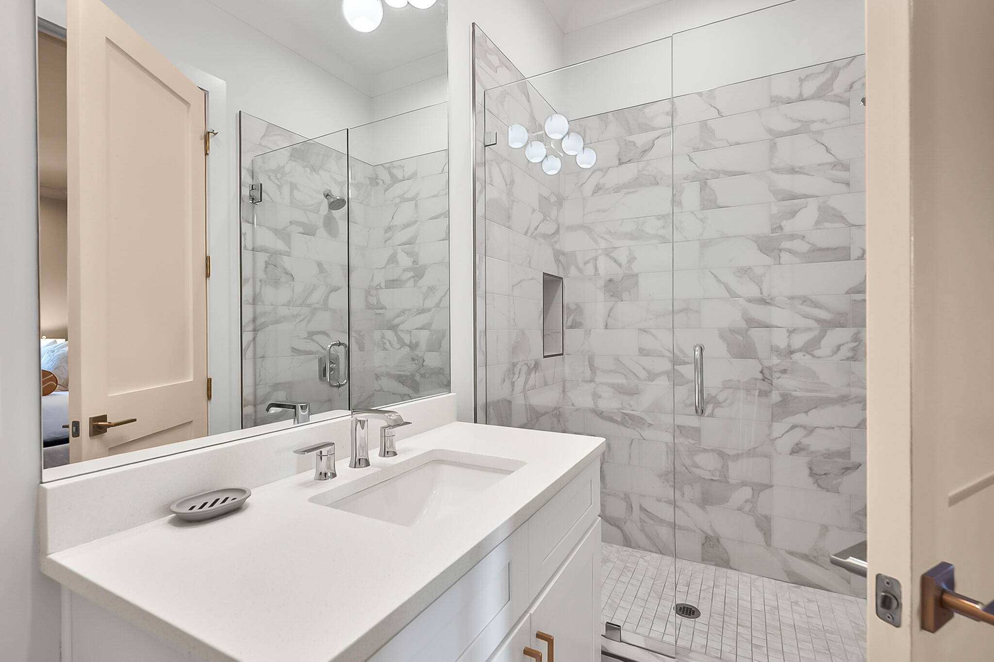 70 Marthas Lane, Unit 1103 Santa Rosa Beach, FL 32459 - Photo 16 of 29 a bathroom with a sink a mirror a shower and a bathtub